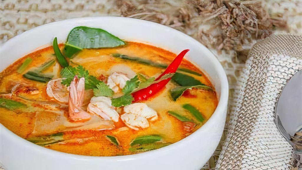 Tom Yum · Spicy sour soup rich with flavors. shrimp, Mushroom, Tomatoes, Lemon Grass, Onions