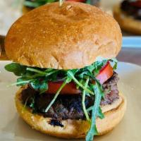 Kafta Beef* Burger · hand-formed beef and pomegranate molasses patty, mixed with minced parsley, jalapenos and on...