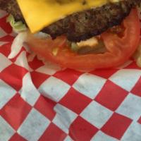 Cheeseburger Deluxe · Single meat with cheese, lettuce, tomatoes, onion and mustard. Served with fries and a 24 oz...