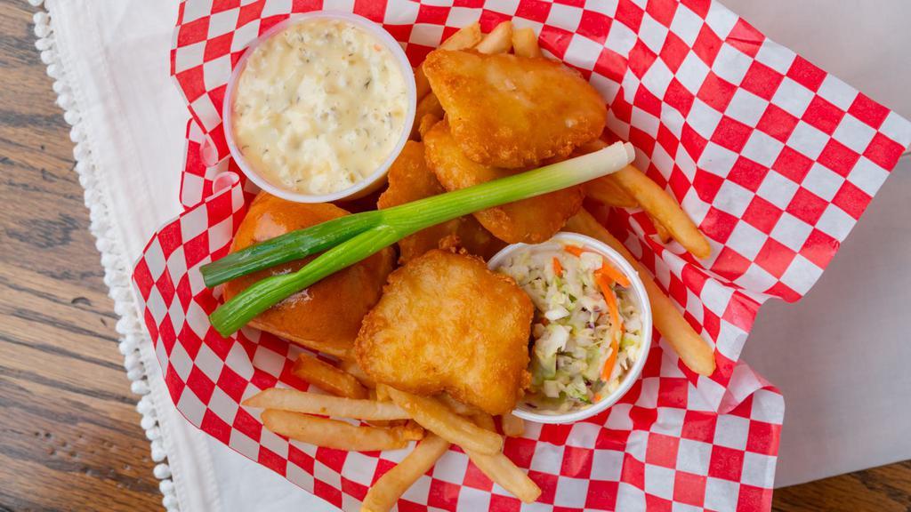 Fish Dinner · Tender filets of Icelandic cod, deep fried and served with French fries, cole slaw, hot roll and fresh green scallion.