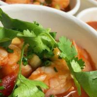 Shrimp Ceviche · Marinated Shrimp, tomato, lime, cucumber, tortilla chips