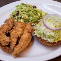 Ranch Chicken Sandwich · Fresh tenders on a toasted egg bun with ranch dressing, lettuce, red onion, and choice of si...