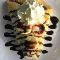 Pan Fried Crepe · 2 full crepes  with your choice of Banana & Nutella or  Traditional with strawberry preserve...