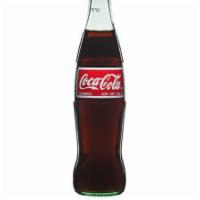 Mexican Coke · I bottle of Coke, needs an opener to open!