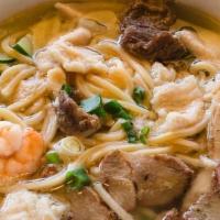 House Noodle Soup · Soft noodles with a combination of shrimp, chicken, beef, pork as well as cabbage and carrot...