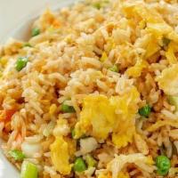 Egg Fried Rice · Most popular entrée. Authentic fried rice cooked with eggs, peas and carrots and green onions.