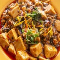 Ma Po Tofu (Ground Pork) · New entrée. Tofu, peas, carrots, onions, straw mushroom in a spicy dried chili pepper, chili...