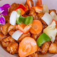 Sweet And Sour Pork · Deep fried battered pork covered with sweet and sour sauce, pineapple, carrots, bell pepper ...