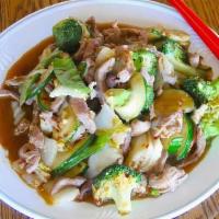 Szechuan Pork · Spicy. Authentic szechuan style with sliced pork, stir fried with fresh vegetables (Napa cab...
