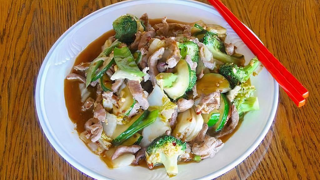 Szechuan Pork · Spicy. Authentic szechuan style with sliced pork, stir fried with fresh vegetables (Napa cabbage, broccoli, zucchini and carrot).