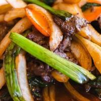 Mongolian Steak · Tender sliced steak wok fried with scallions and white onions with chef’s special soy sauce.