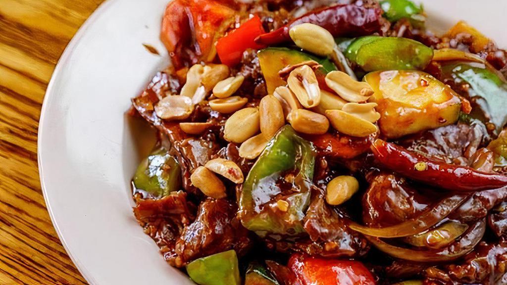 Kung Pao Beef · Spicy. Sliced tender beef sautéed with chili pepper, zucchini, white onions, carrots and roasted peanuts in our chef’s chili seared soy sauce.