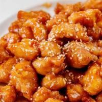 Sesame Chicken · White meat chicken chunk lightly battered and fried, then drizzled over our chef’s spicy sau...