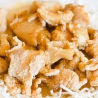 Honey Crisp Chicken · Lightly battered chicken breast coated with honey glazed over rice sticks.