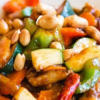 Kung Pao Chicken · Spicy. Sliced chicken breast sautéed with chili pepper, zucchini, white onions, carrots and ...