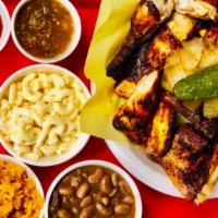 2 Whole Chickens · With rice, beans, macaroni salad and tortillas.