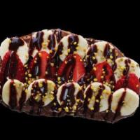 Nutella Toast · nutella, banana, strawberry, bee pollen, cacao nibs, chocolate agave drizzle