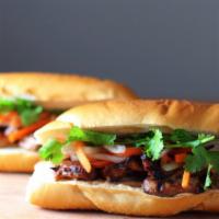 Sandwich Banh Mi · Authentic Vietnamese sandwich stuffed with special butter, homemade pickles, fresh cilantro,...