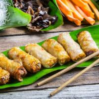 Egg Rolls (6) - Cha Gio · Crunchy rolls that come with fresh lettuce leaves, beansprout, refreshing mint leaves, homem...