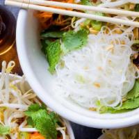 Vermicelli Noodle Bowl - Bun · Cool perfectly cooked noodle served with home made sauce on the side, comes with mixture of ...