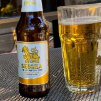 Singha Thai Beer · The lager beer that is the Taste of Thailand. 12 oz. bottles. (Beer glass shown in photo is ...