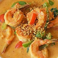 Panaeng Curry · Thick Thai coconut curry featuring ground peanuts and sweet basil, simmered with distinctive...