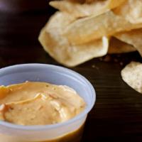 Chips & Queso · House made Corn tortilla chips and Queso