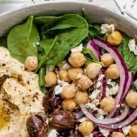 Hummus Bowl · Hummus, choice of protein, chopped cucumber, tomato salad, sumac onions, and Mediterranean p...