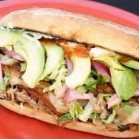 Tres Cerditos Sandwich · Two grilled hot dogs, chorizo, pork carnitas, refried beans, pickled onions, habanera salsa,...