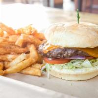 The T-Rex Burger · 1/2lb. Black Angus burger patty, lettuce, roma tomatoes, onions, and roasted garlic mayo. Yo...