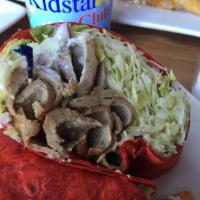 Gyro Wrap · Tomato/Basil wrap with sliced gyro meat, lettuce, roma tomatoes, onions, and tzatziki. Comes...