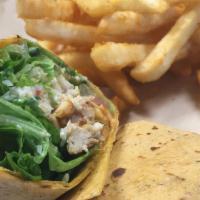 Chicken Caesar Wrap · Tomato/Basil wrap with grilled chicken breast, romaine lettuce, croutons, parmesan, roma tom...