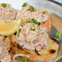 Lobster Crostini · Succulent and sweet lobster meat with celery, green onions and Cajun mayo served with fresh ...
