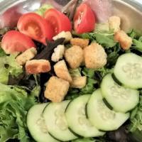 House Salad · Artisan and romaine lettuce with tomatoes, cucumbers, croutons and your choice of dressing.