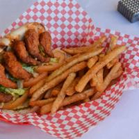 Breaded Shrimp Po Boy · Lightly fried breaded shrimp served with lettuce, tomato, pickle, and Cajun Mayo on a toaste...