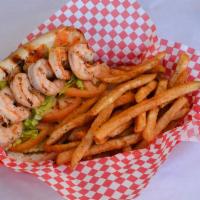 Grilled Shrimp Po Boy · Garlic butter grilled shrimp served with lettuce, tomato, pickle, and Cajun Mayo on a toaste...