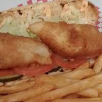 Cod Po Boy · Beer battered white fish fried and served with lettuce, tomato, pickle, and Cajun mayo on a ...