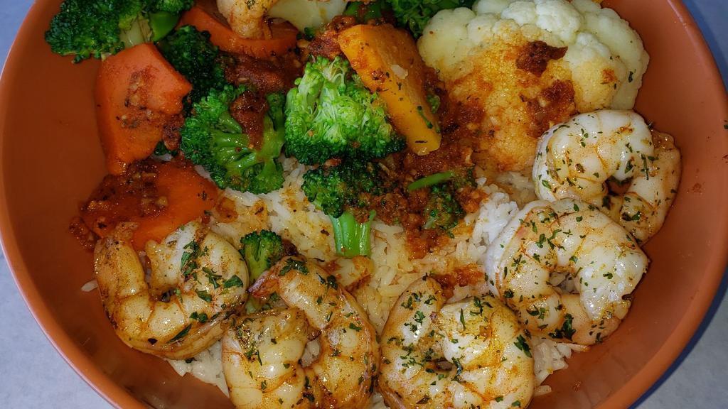 Grilled Shrimp · Served with garlic butter and vegetables over rice or linguine.