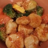Scallop Bowl · Boil style with garlic butter and vegetables over rice or linguine.