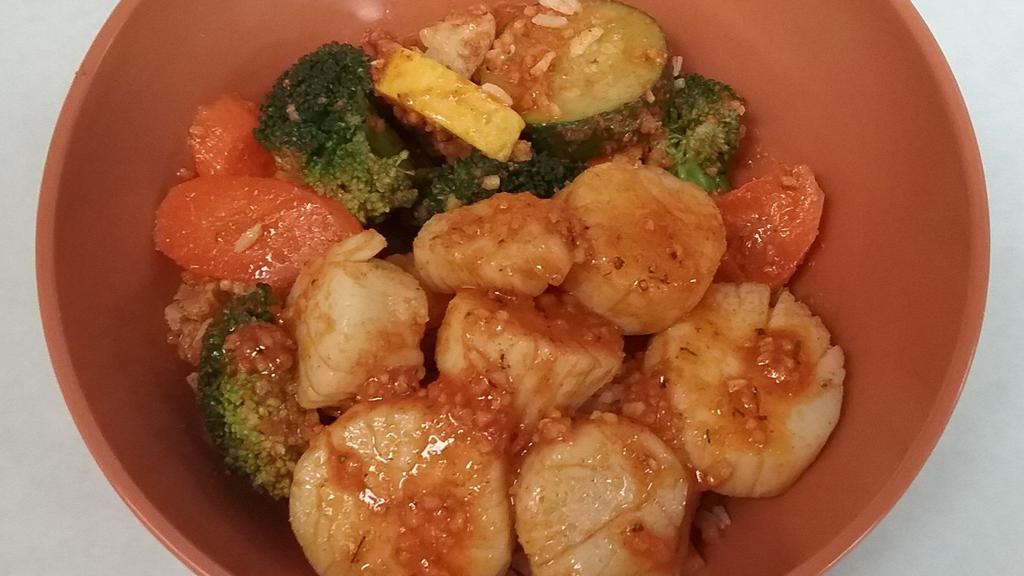 Scallop Bowl · Boil style with garlic butter and vegetables over rice or linguine.