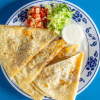 Meat Quesadilla · Big flour tortilla with melted cheese and your choice of meat