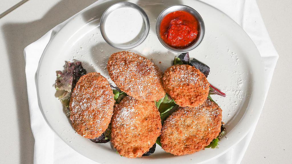 Crispy Zucchini · Vegetarian delights. Fresh zucchini slices tossed with panko breadcrumbs and served with marinara or ranch dressing.