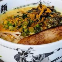 Curry Ramen · With green onions, bean sprouts, spinach, cloud ear mushrooms, and one piece of pork belly a...