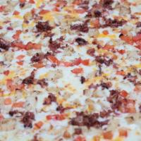 Grilled Chicken Gourmet Pizza · Grilled chicken, crispy bacon, onions and roma tomatoes. Made with creamy gourmet garlic whi...