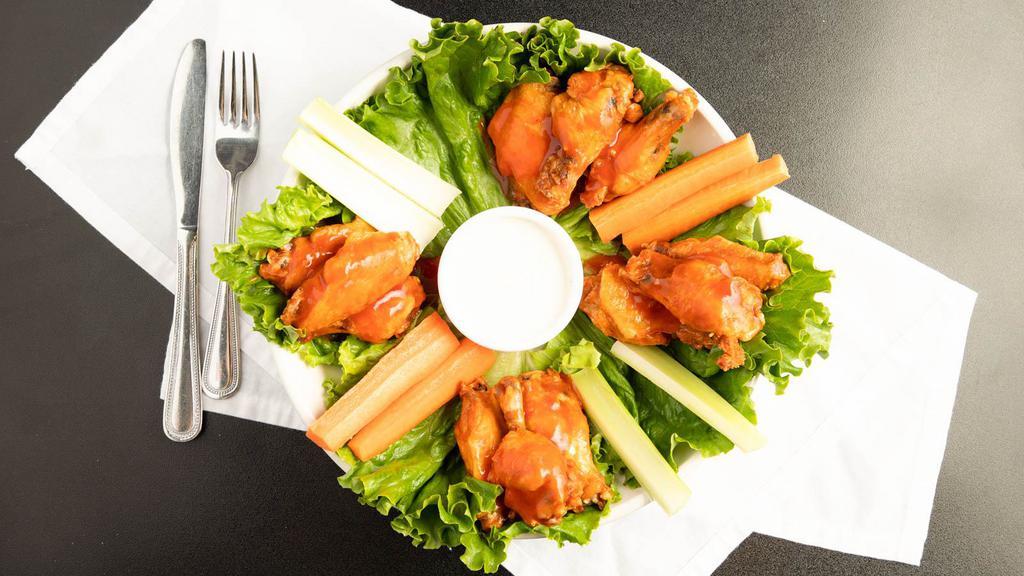 Wings - Whole · Bone-in wings with your choice of sauce.