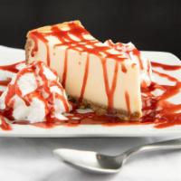 New York Cheese Cake · New York baked style cheesecake with your choice of topping.