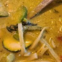 Green Curry · Spicy. Green curry paste with coconut milk, bamboo shoots, bell peppers, zucchini and fresh ...