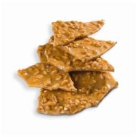 Peanut Brittle · Crispy and sweet, full of toasted peanuts.  Old-fashioned favorite!  4 ounce package.