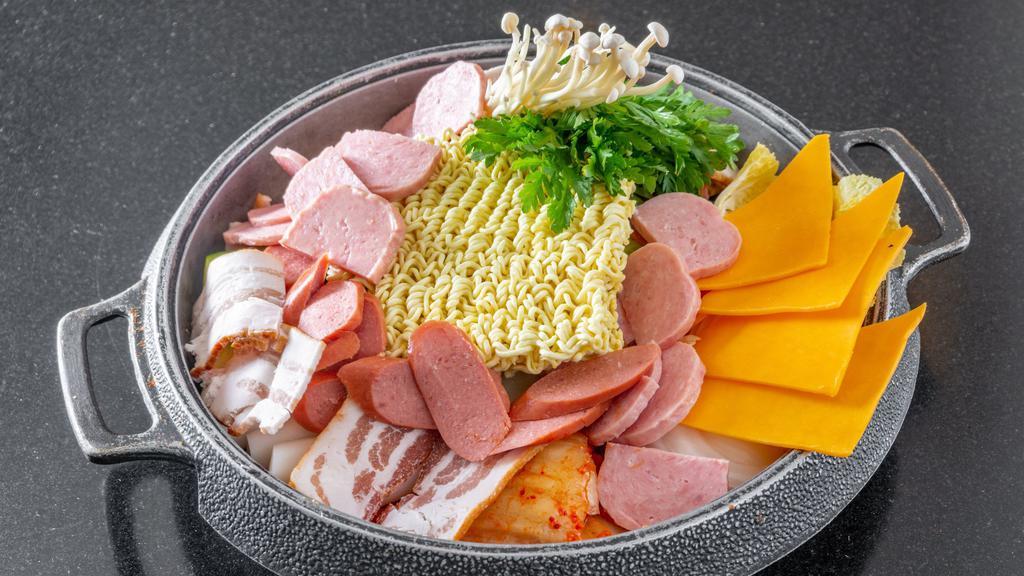Sausage & Ham Hot Pot · Assorted sausages, ham, and vegetables in a special hot pot. Spicy.