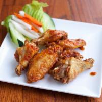 Butterfly Wings (A) · Party wings wok in pepper salted, fish or tamarind sauce.